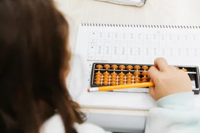 Student practicing abacus mental math